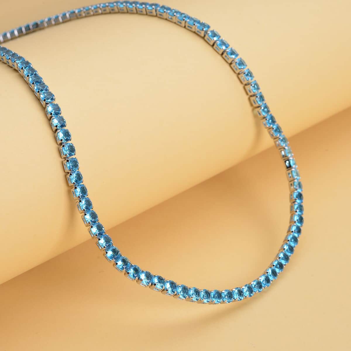 Simulated Blue Topaz Tennis Necklace 18 Inches in Silvertone 53.00 ctw image number 1