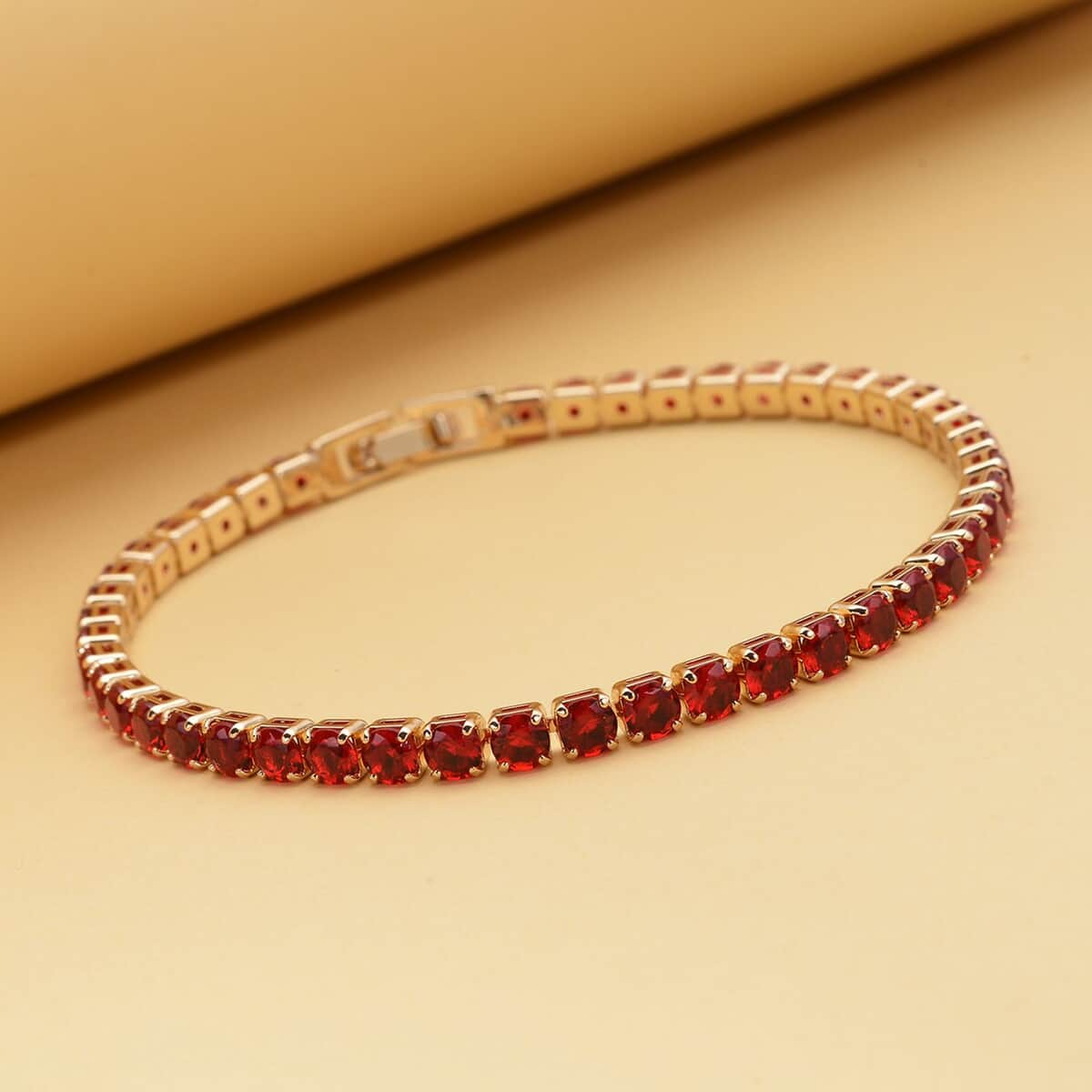 Simulated Red Diamond Tennis Bracelet in Goldtone (6.50 In) 13.00 ctw image number 1