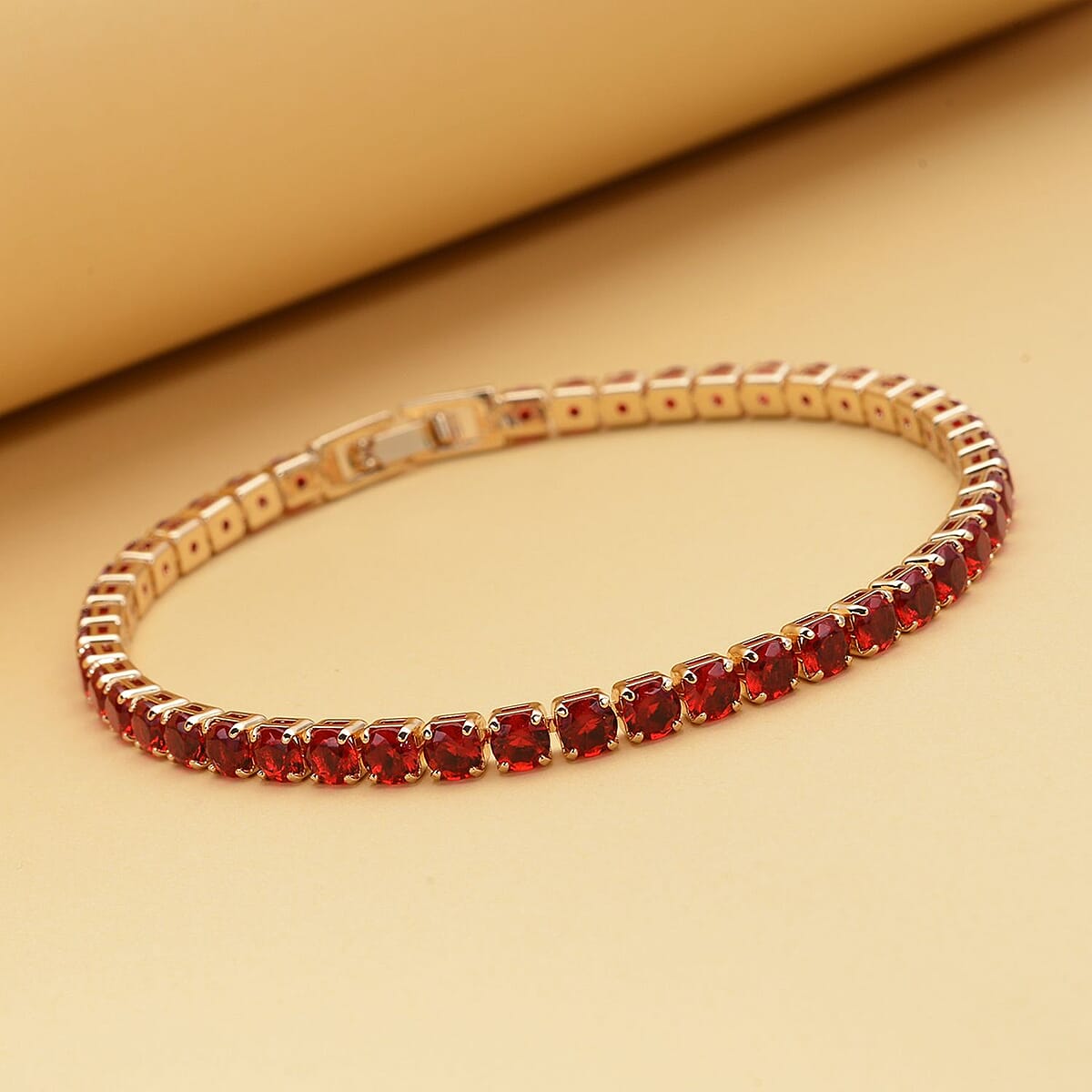 Simulated Red Diamond Tennis Bracelet in Goldtone (7.25 In) 13.00 ctw image number 1