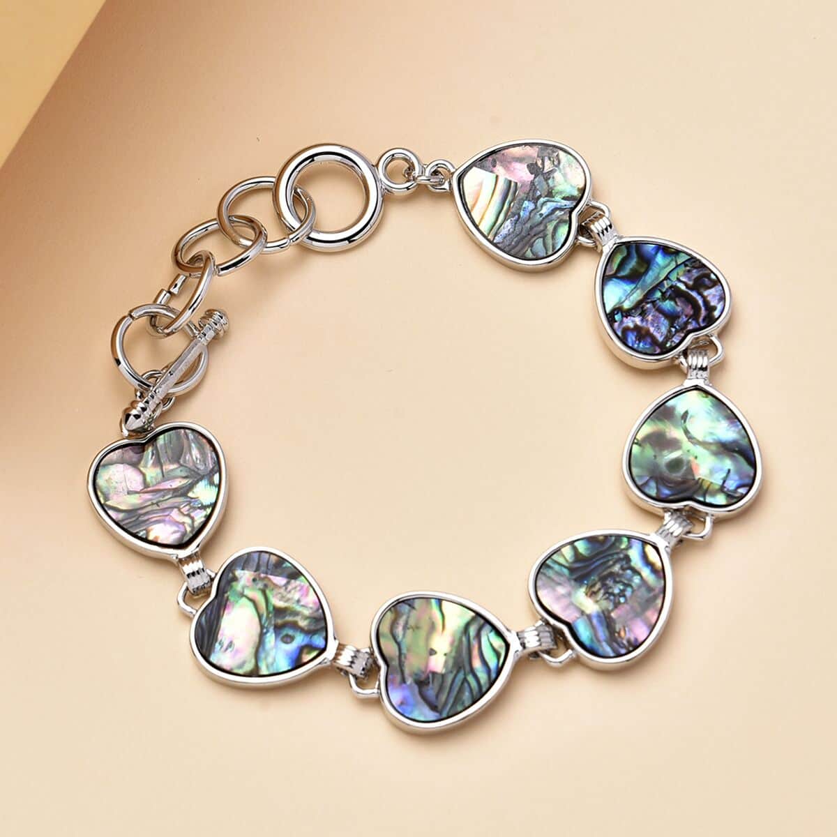 Abalone Shell Heart Shaped Link Bracelet in Silvertone (7-9In) image number 1