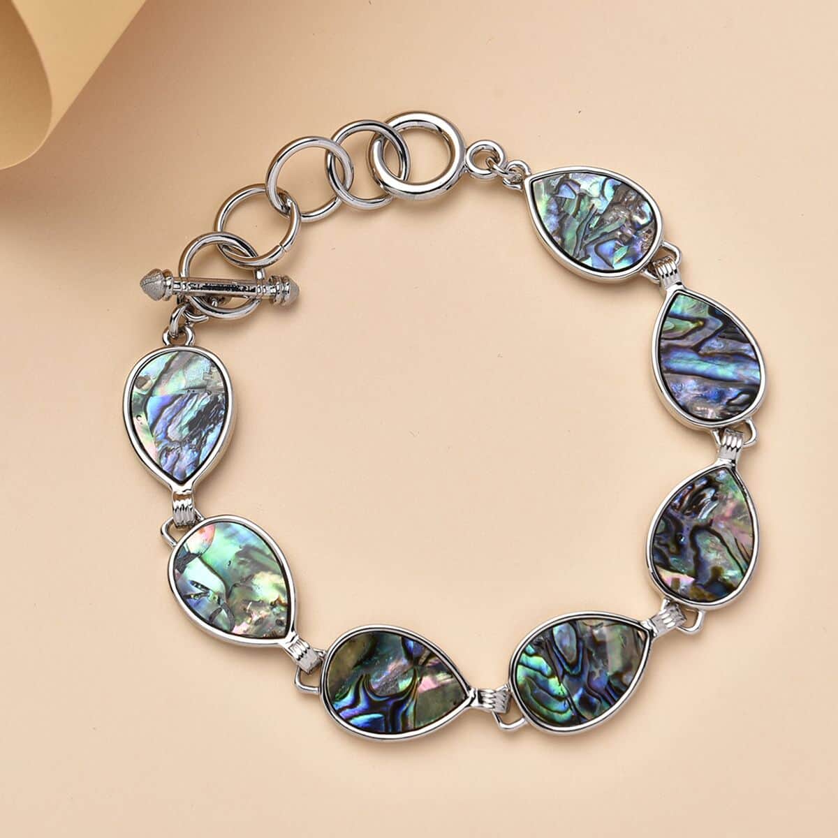 Abalone Shell Pear Shaped Link Bracelet in Silvertone (8-10In) image number 1