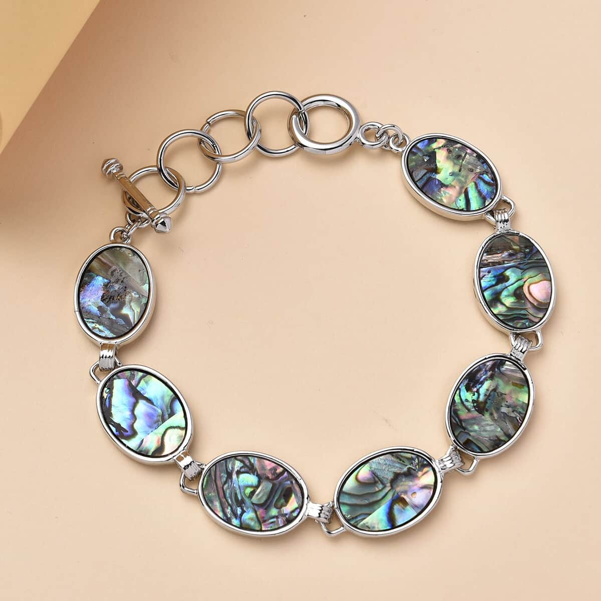 Abalone Shell Oval Shaped Link Bracelet in Silvertone (8-10In) image number 1